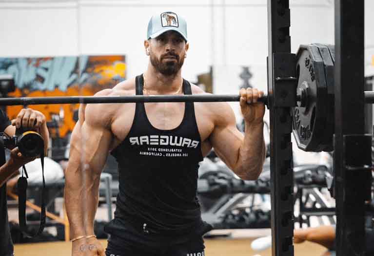 Bradley Martyn posing during the workout
