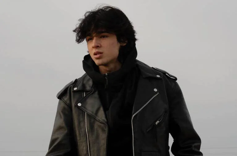 Isaac Arellanes in a black jacket